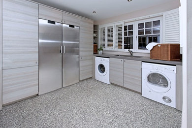 Laundry room - contemporary laundry room idea in Dallas