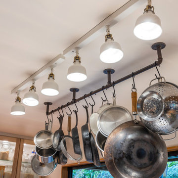 pots hanging from the ceiling, adding a touch of whimsy