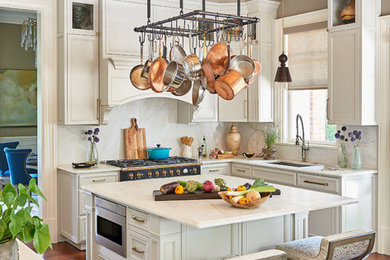 Inspiration for a transitional kitchen in Other with recessed-panel cabinets, white cabinets, marble benchtops, white splashback, stainless steel appliances, dark hardwood floors, with island, brown floor, white benchtop and an undermount sink.