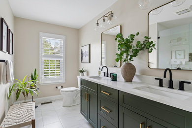 Mid-sized transitional bathroom photo in Philadelphia with green cabinets and a built-in vanity