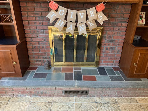 Any ideas on how to spruce up this fireplace? It needs a makeover....