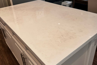 Kitchen - kitchen idea in San Diego with white countertops