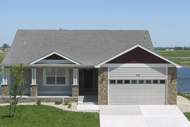 Example of a large minimalist home design design in Denver