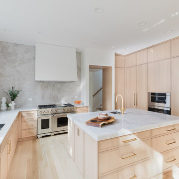 Glencoe Natural Minimalist Kitchen With Full Slab Backsplash and Built-In Warmth