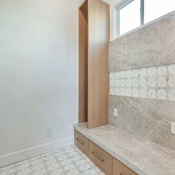 Prayer Room Featuring Custom Cabinetry and Vibrant Mosaic Tile Accents