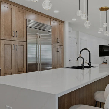 Warm Cherry Kitchen and Powder Room Remodel with Waterfall Island in Herndon, VA