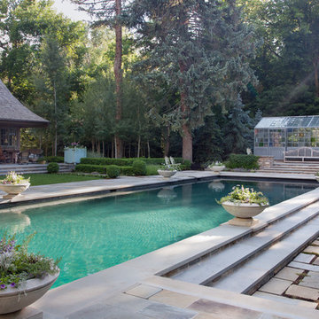 Greenhouse And Outdoor Living Near Pool