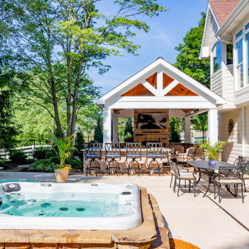 Pool Side Covered Patio with Fireplace and Bar Area