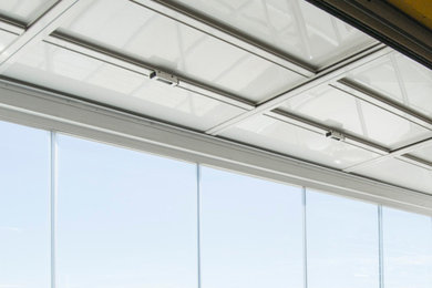 RESTAURANTES. Combinación de un techo DGLASS 16 + cortinas de cristal DGLASS 20