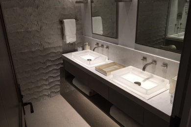 Bathroom - mid-sized contemporary master gray tile and stone tile ceramic tile and gray floor bathroom idea in Denver with flat-panel cabinets, dark wood cabinets, an undermount sink and quartzite countertops