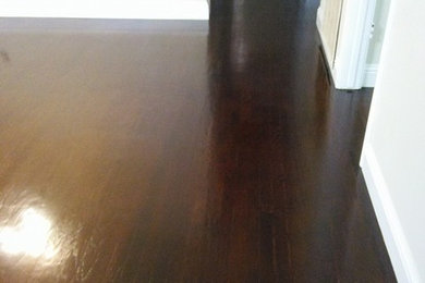 old badly damage floor stain expresso color