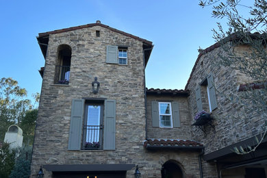 Inspiration for a rustic exterior home remodel in Orange County