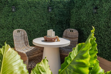 Example of a beach style deck design in Orlando