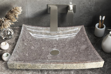 Inspiration for a mid-sized modern powder room remodel in Houston with gray cabinets and a built-in vanity
