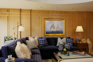 Mid-sized transitional enclosed carpeted living room photo in New York with beige walls, no fireplace and a media wall