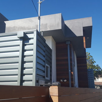 24 Gauge Steel, Collector Box and Downspout on Matching Wall Panels.