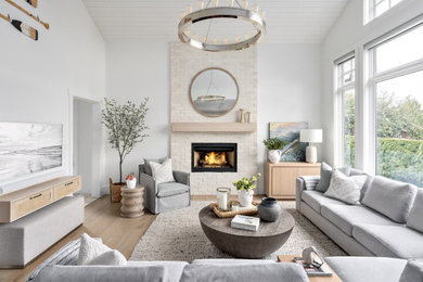 Example of a beach style home design design in Vancouver