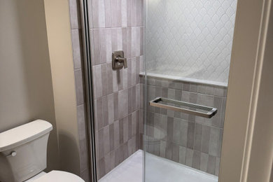 Example of a large ceramic tile vinyl floor bathroom design in Chicago