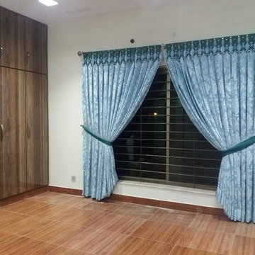 Curtains and wallpaper installation