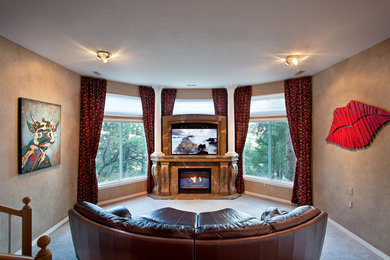 Inspiration for a timeless living room remodel in Denver with a concrete fireplace