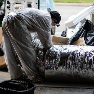 Technician gearing up to install new ducting