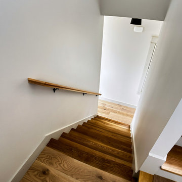 Elegant Staircase with Modern Chandelier Lighting