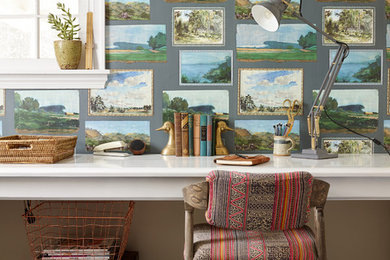 Small built-in desk home office photo in Philadelphia with green walls