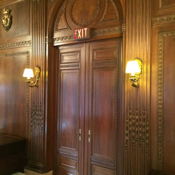 Hand Carved Doors in restored opening.