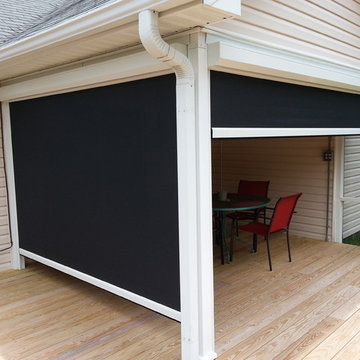 Motorized roll down solar shade