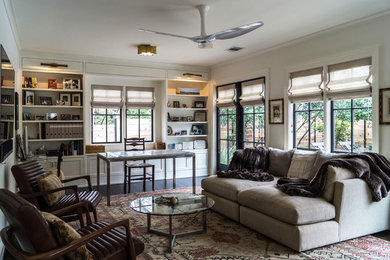 Example of a classic family room design in Austin