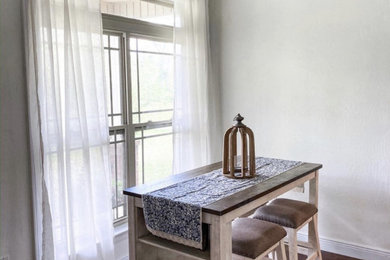 Example of a farmhouse dining room design in Miami