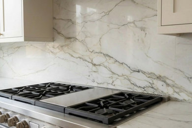 Example of a beach style kitchen design in Toronto