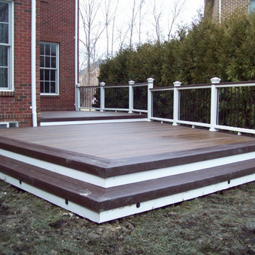 TREX TRANSCENDS SPICED RUM WITH VINTAGE LANTERN BORDER & WHITE TREX RAILING