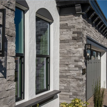 Contemporary White and Dark Grey Home Facade With Modern Light Fixtures