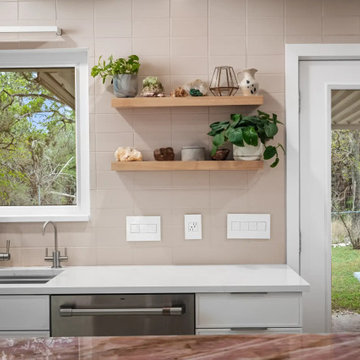 Backlit Stone Island with Custom White Cabinets