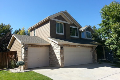 Mid-sized elegant brown two-story concrete fiberboard exterior home photo in Denver