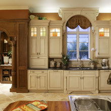 Arched window casing over kitchen sink