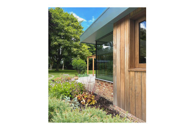 Inspiration for a contemporary house exterior in Cambridgeshire.