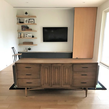 Modern Toronto living room with sliding panel