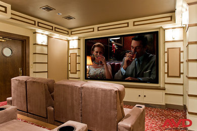 Inspiration for a large midcentury enclosed home theatre in Boston with beige walls, carpet and a projector screen.