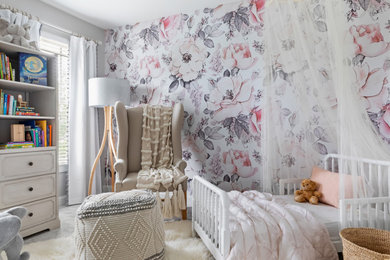 Example of an eclectic wallpaper bedroom design in Raleigh with multicolored walls
