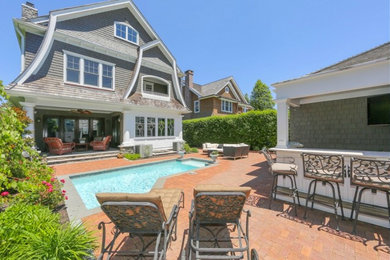 Inspiration for a timeless backyard patio remodel in New York