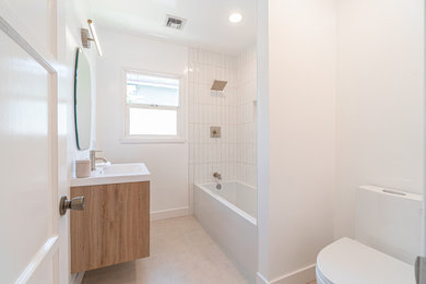 Inspiration for a small modern white tile ceramic tile, white floor and single-sink bathroom remodel in Los Angeles with quartzite countertops, white countertops, a niche and a floating vanity