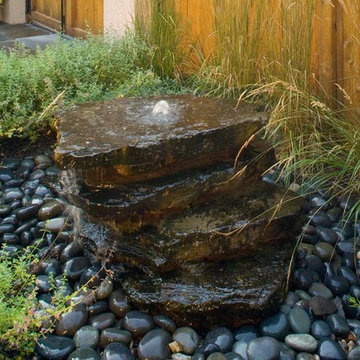 Stone Bubble Masks Urban Noise | Water Features
