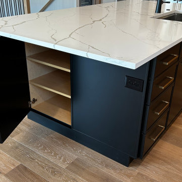 Maple Pecan Stain and Painted Black Kitchen Design in Bettendorf, Iowa
