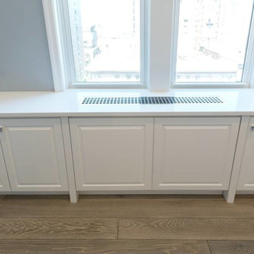Bedroom with custom PTAC cover