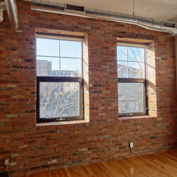 Interior reclaimed brick with barn beam lintels.