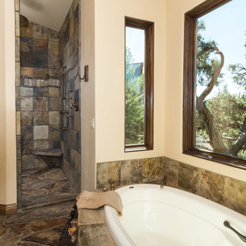 Water tower inspired home master bath suite view of shower