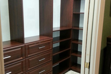 Minimalist closet photo in Miami