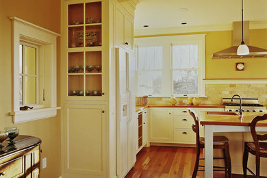 Photo of a transitional home design in Burlington.